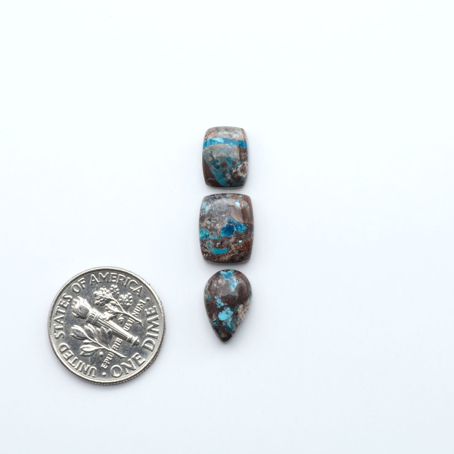 Rare Bisbee Turquoise cabochons with rich blue color and classic brown matrix. Perfect for jewelry makers, collectors, and lovers of fine American turquoise.
