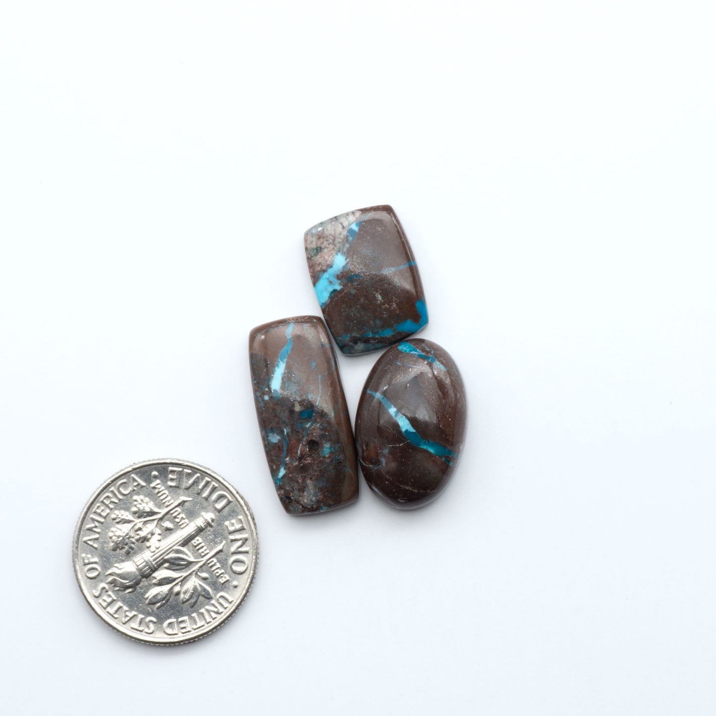 Rare Bisbee Turquoise cabochons with rich blue color and classic brown matrix. Perfect for jewelry makers, collectors, and lovers of fine American turquoise.