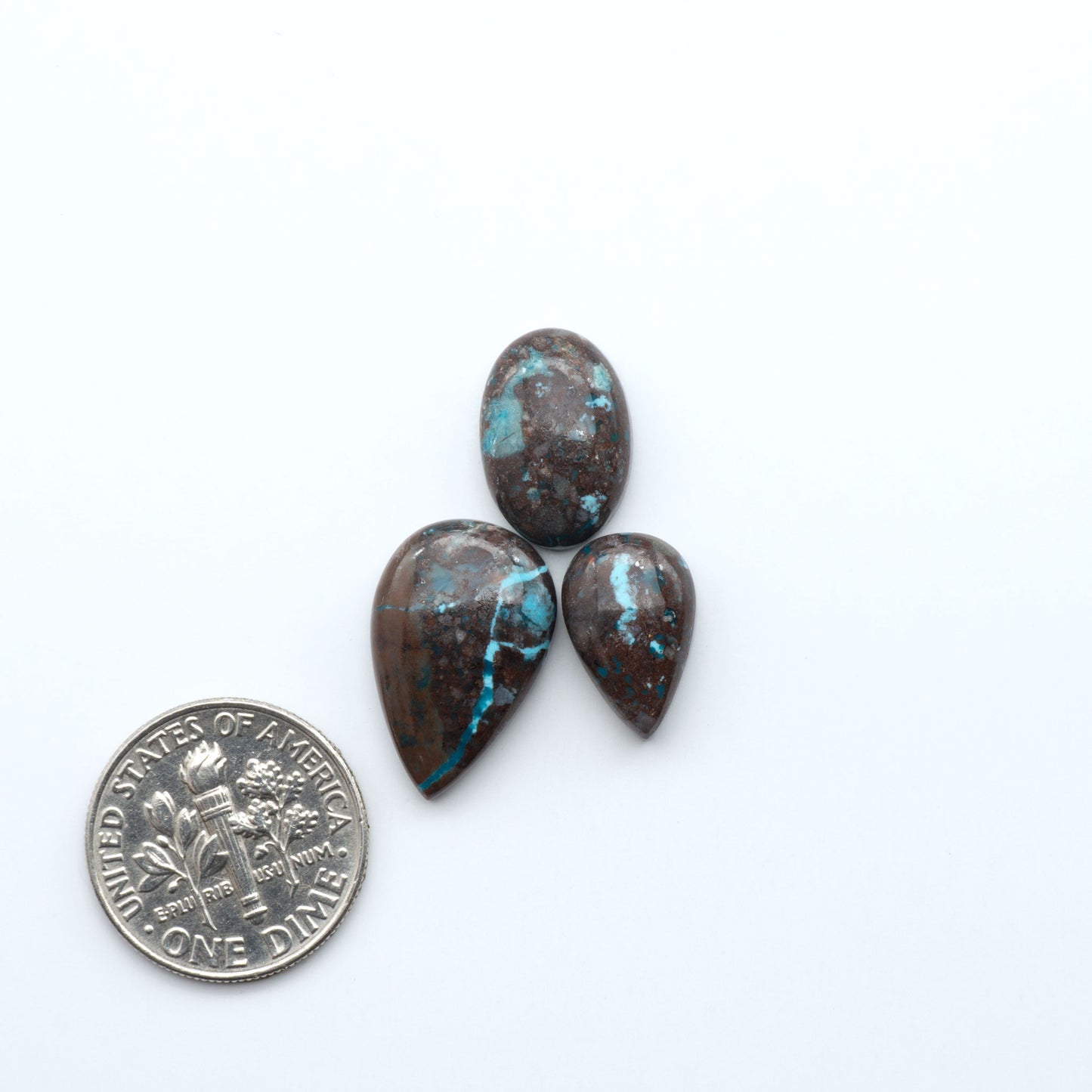 Rare Bisbee Turquoise cabochons with rich blue color and classic brown matrix. Perfect for jewelry makers, collectors, and lovers of fine American turquoise.