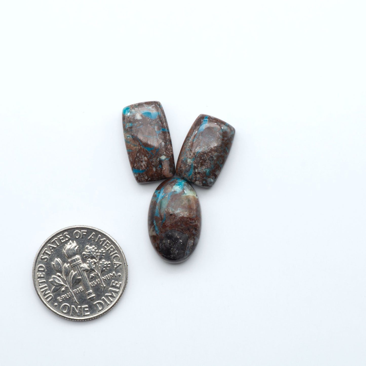 Rare Bisbee Turquoise cabochons with rich blue color and classic brown matrix. Perfect for jewelry makers, collectors, and lovers of fine American turquoise.