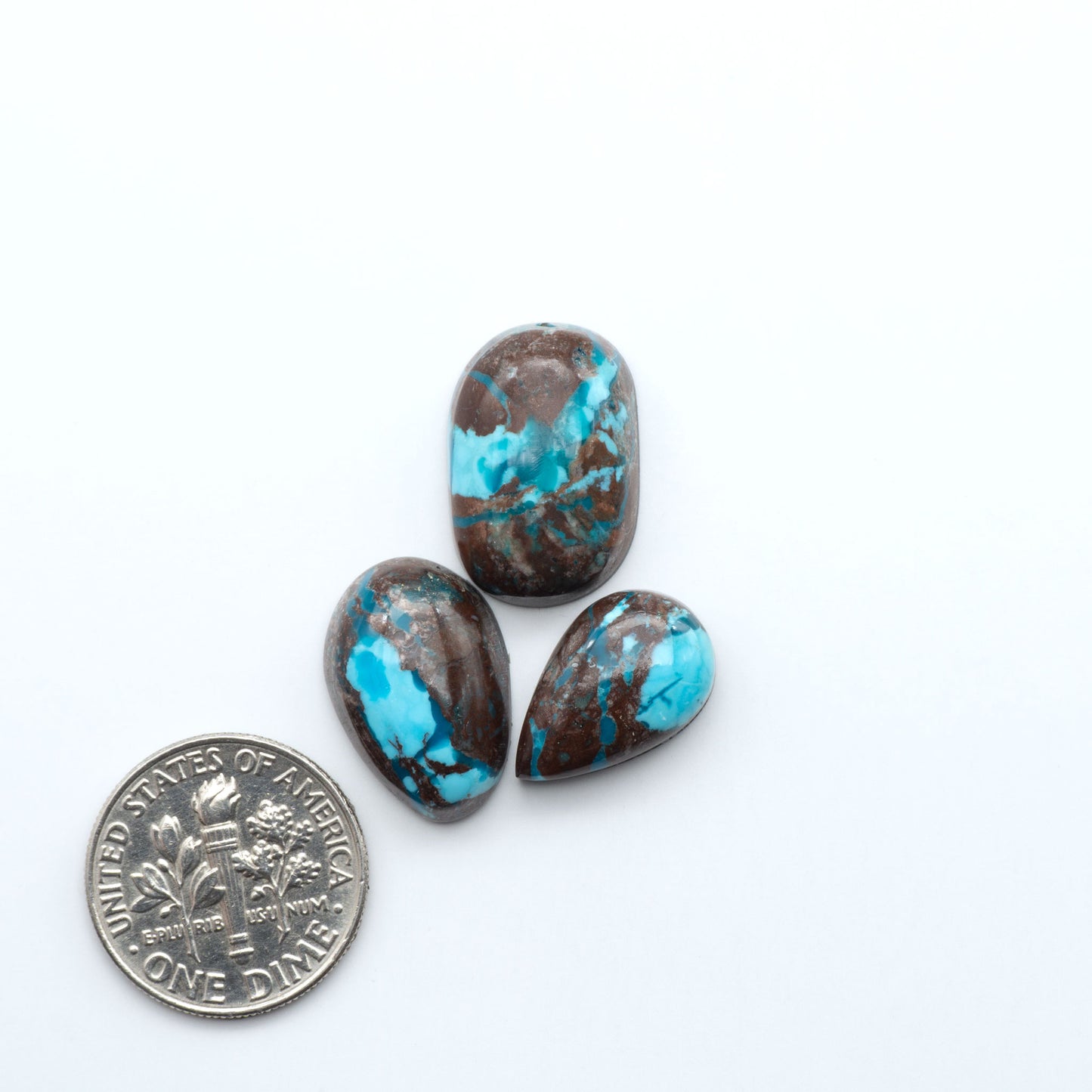 Rare Bisbee Turquoise cabochons with rich blue color and classic brown matrix. Perfect for jewelry makers, collectors, and lovers of fine American turquoise.