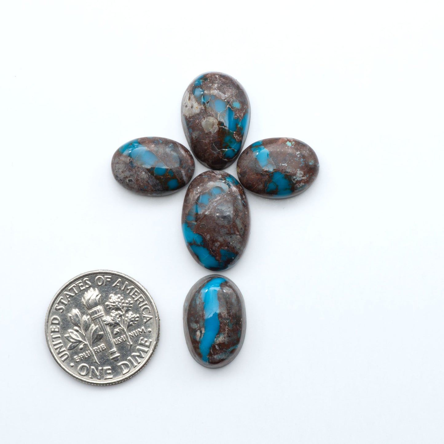 Rare Bisbee Turquoise cabochons with rich blue color and classic brown matrix. Perfect for jewelry makers, collectors, and lovers of fine American turquoise.