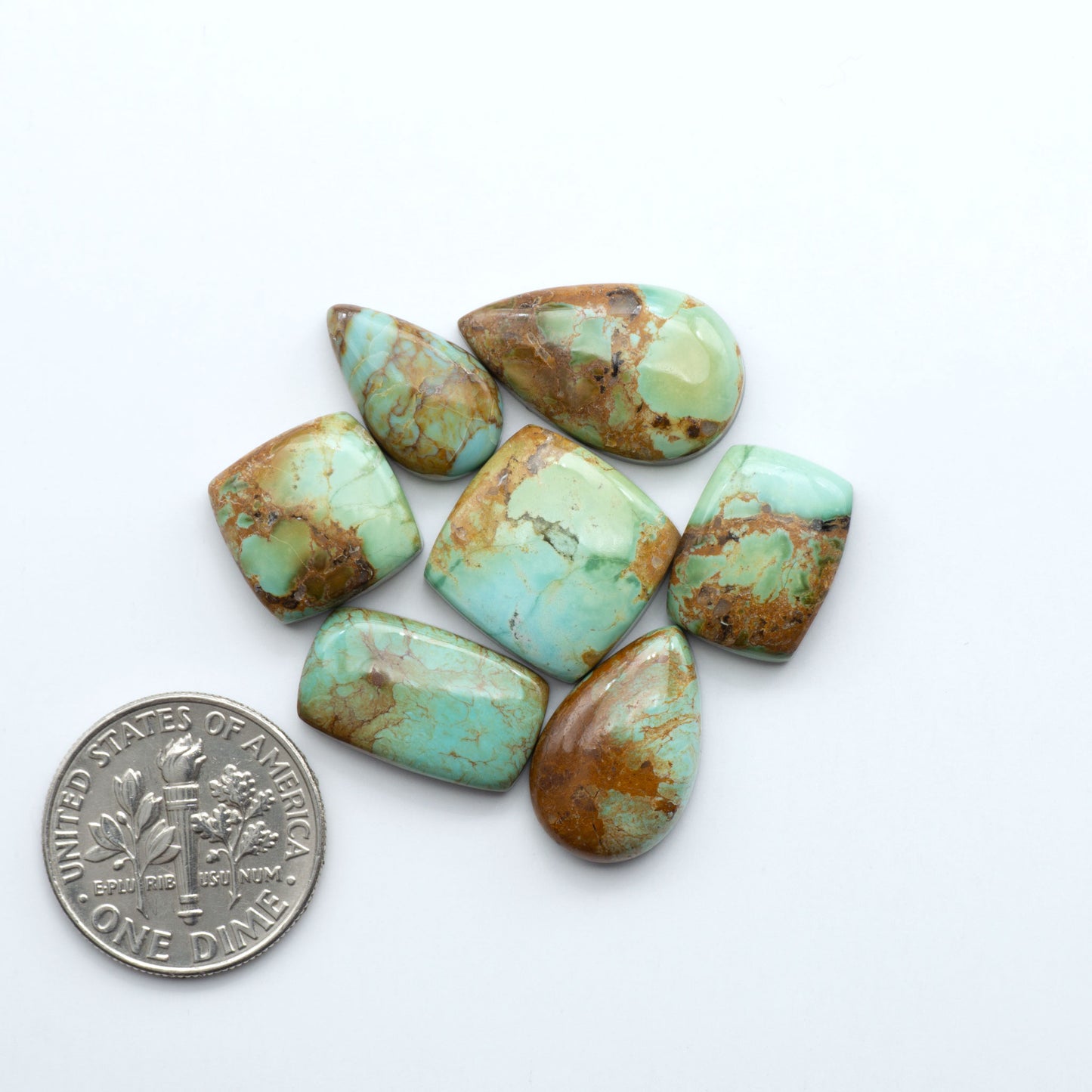 Add a touch of beauty to your collection with our stunning Pilot Mountain Turquoise Cabochons. Perfect for jewelry making each piece is truly one-of-a-kind.