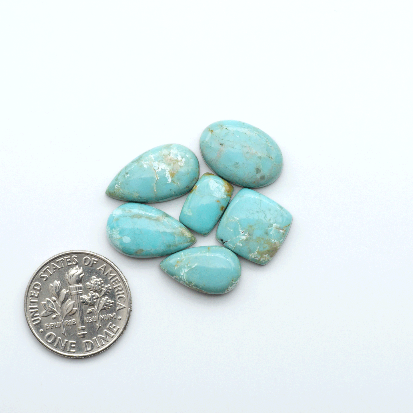 Add a touch of beauty to your collection with our stunning Pilot Mountain Turquoise Cabochons. Perfect for jewelry making each piece is truly one-of-a-kind.