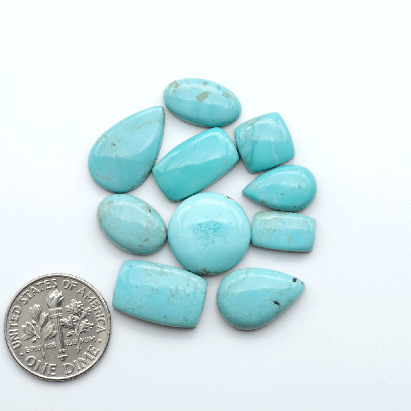 Add a touch of beauty to your collection with our stunning Pilot Mountain Turquoise Cabochons. Perfect for jewelry making each piece is truly one-of-a-kind.