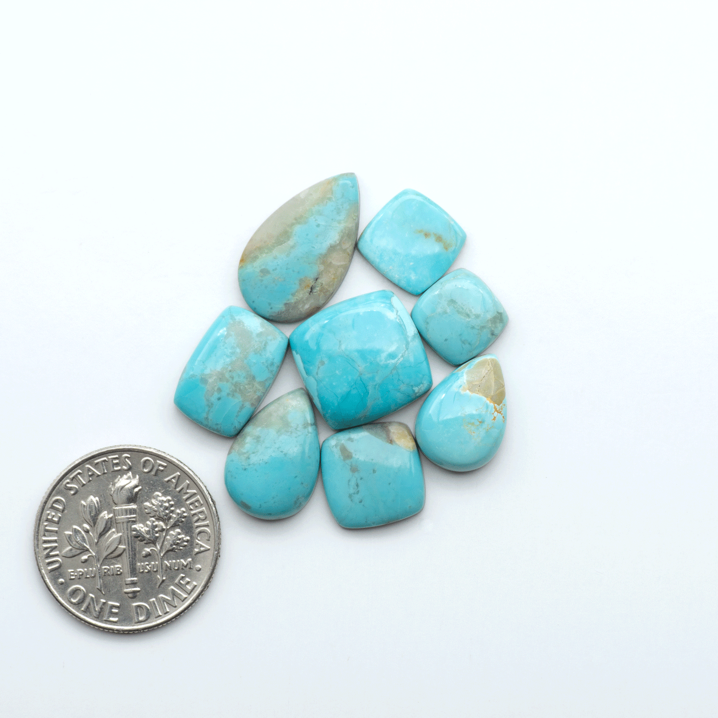 Add a touch of beauty to your collection with our stunning Pilot Mountain Turquoise Cabochons. Perfect for jewelry making each piece is truly one-of-a-kind.