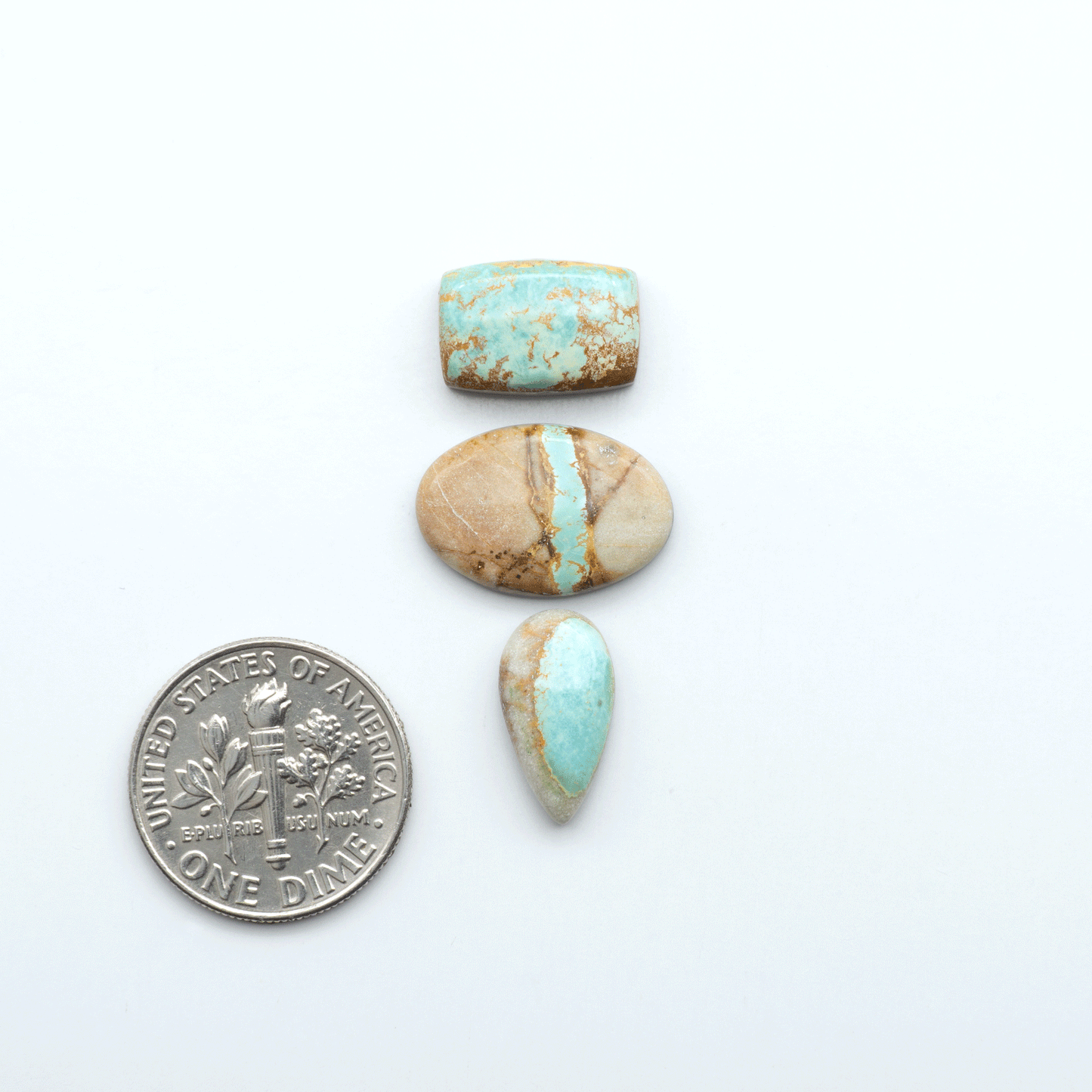 Royston Turquoise cabochons are famous for their distinctive matrix and unique green and blue hues, making them a favored option among jewelry designers.