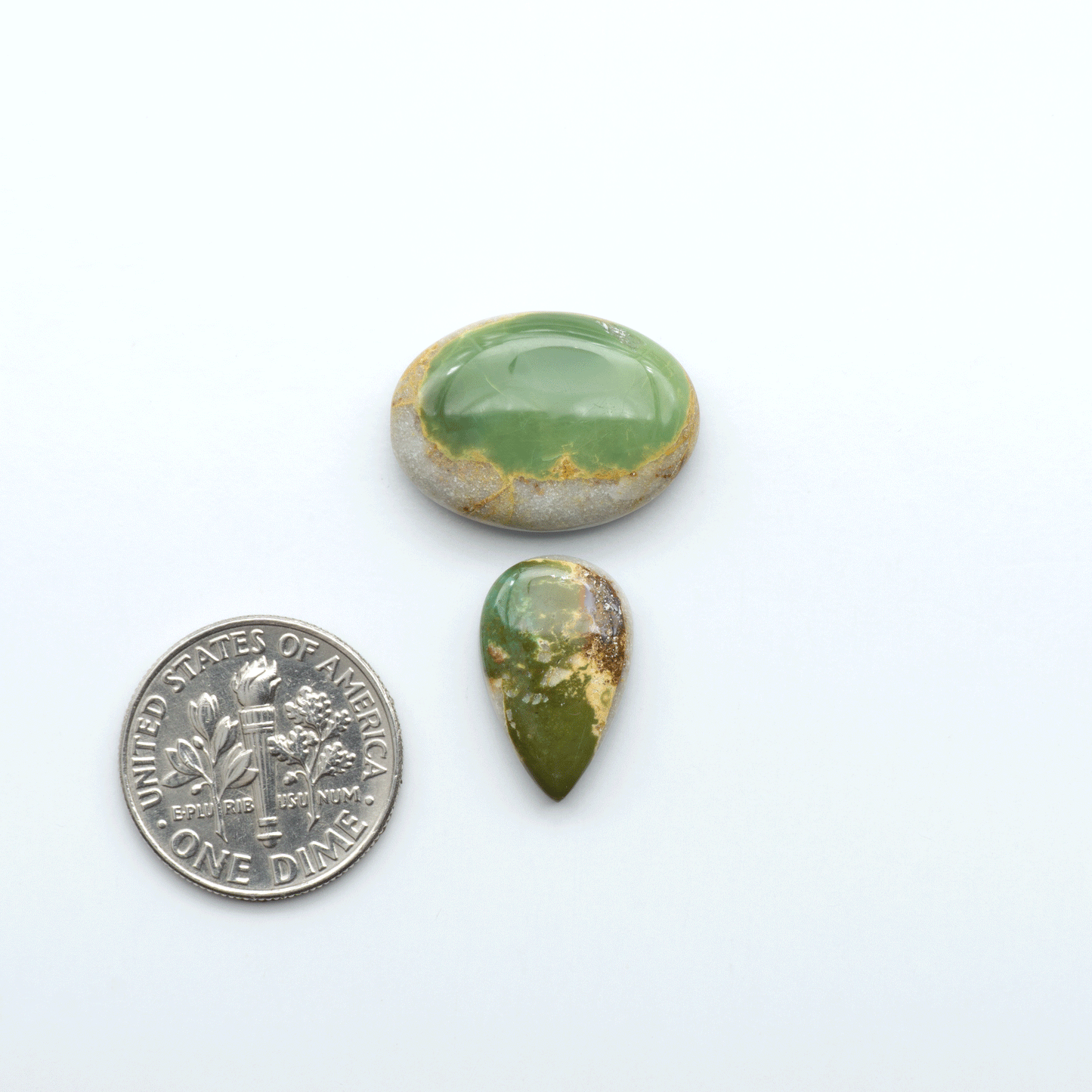 Royston Turquoise cabochons are famous for their distinctive matrix and unique green and blue hues, making them a favored option among jewelry designers.