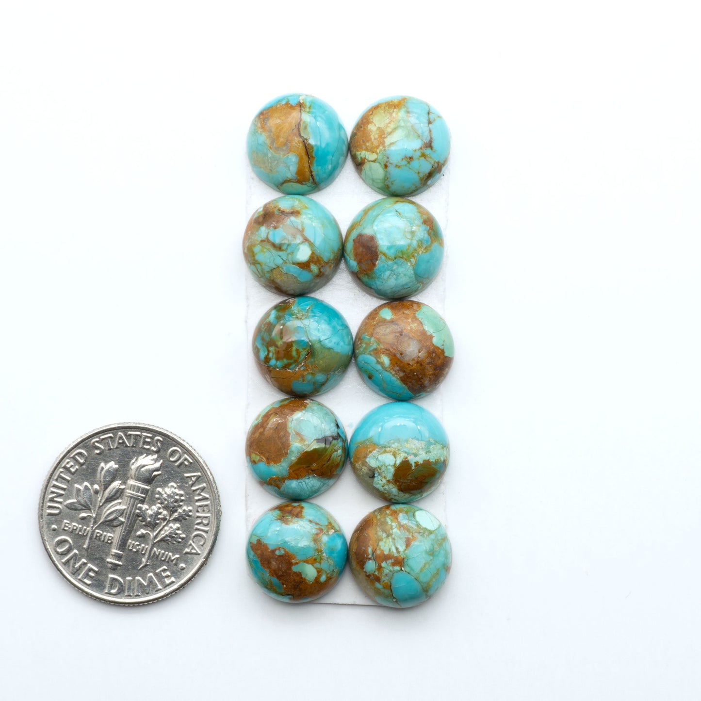 Enhance your jewelry designs with Pressed Turquoise Nugget Cabochons. Crafted from composite materials they add a captivating touch to your creations.