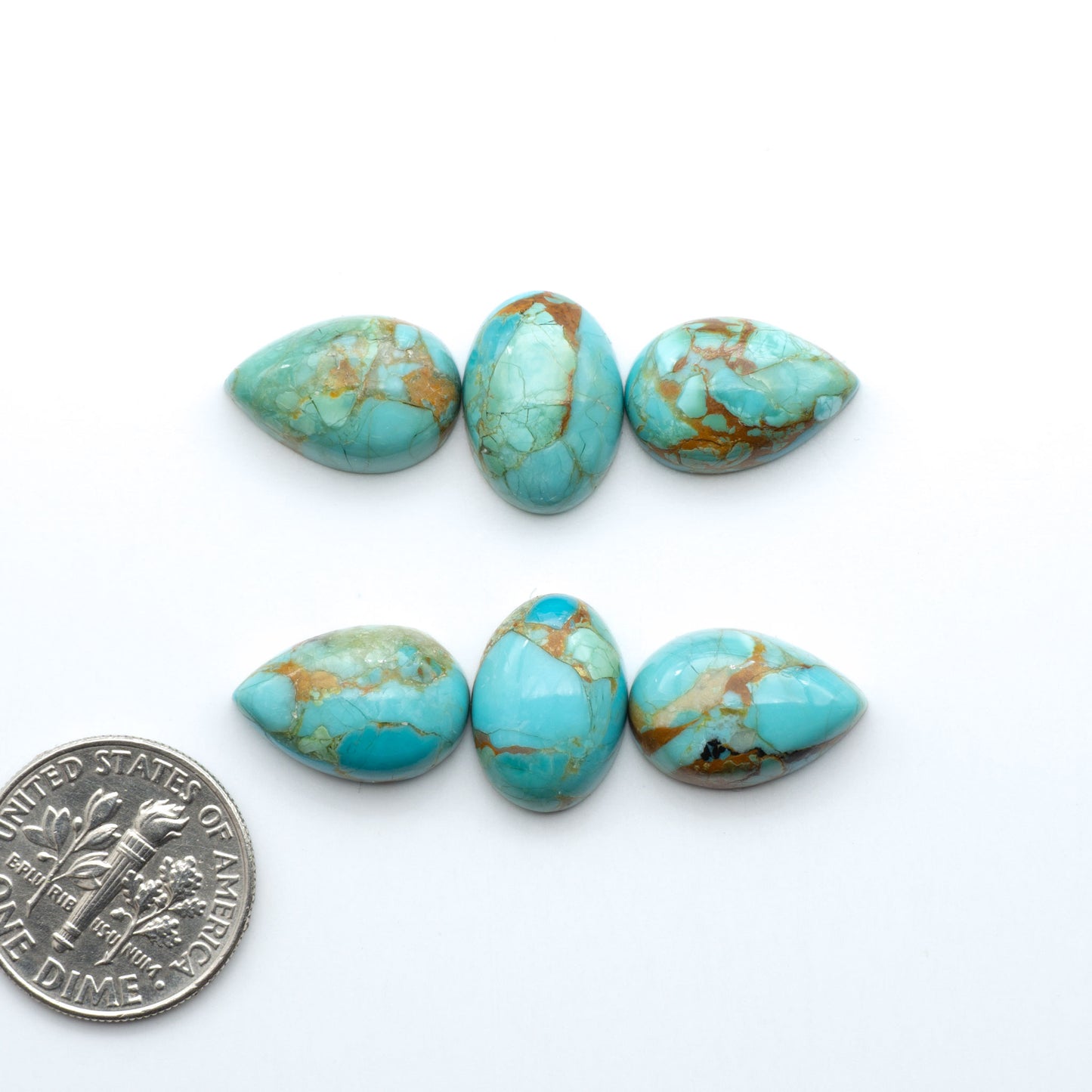 Enhance your jewelry designs with Pressed Turquoise Nugget Cabochons. Crafted from composite materials they add a captivating touch to your creations.
