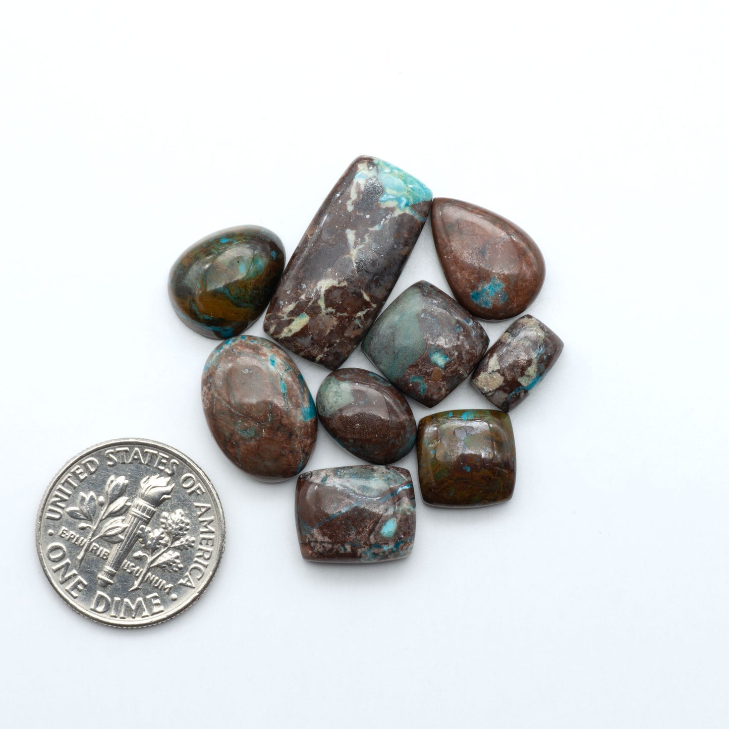 Rare Bisbee Turquoise cabochons with rich blue color and classic brown matrix. Perfect for jewelry makers, collectors, and lovers of fine American turquoise.