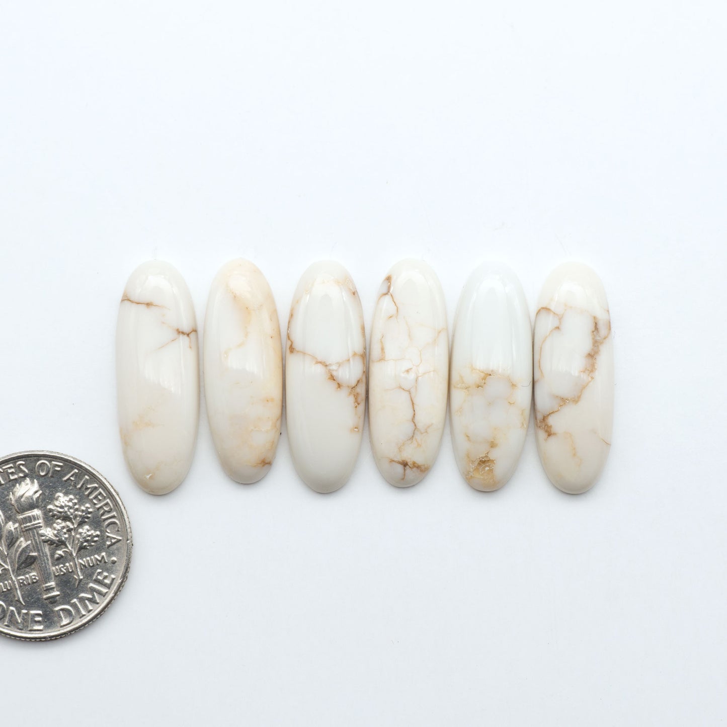 Magnesite Cabochons are a must-have for jewelry makers. These stones feature a unique blend of white and brown making them perfect for a variety of designs.