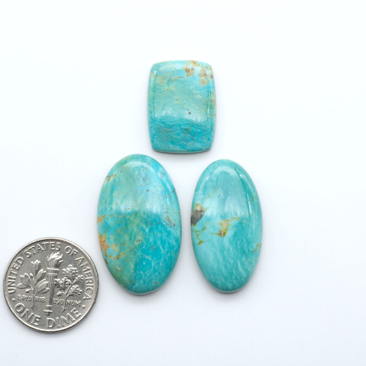 Experience the beauty of Turquoise Mountain Cabochons. With their distinctive blue and green color, these gemstones are perfect for any jewelry piece.