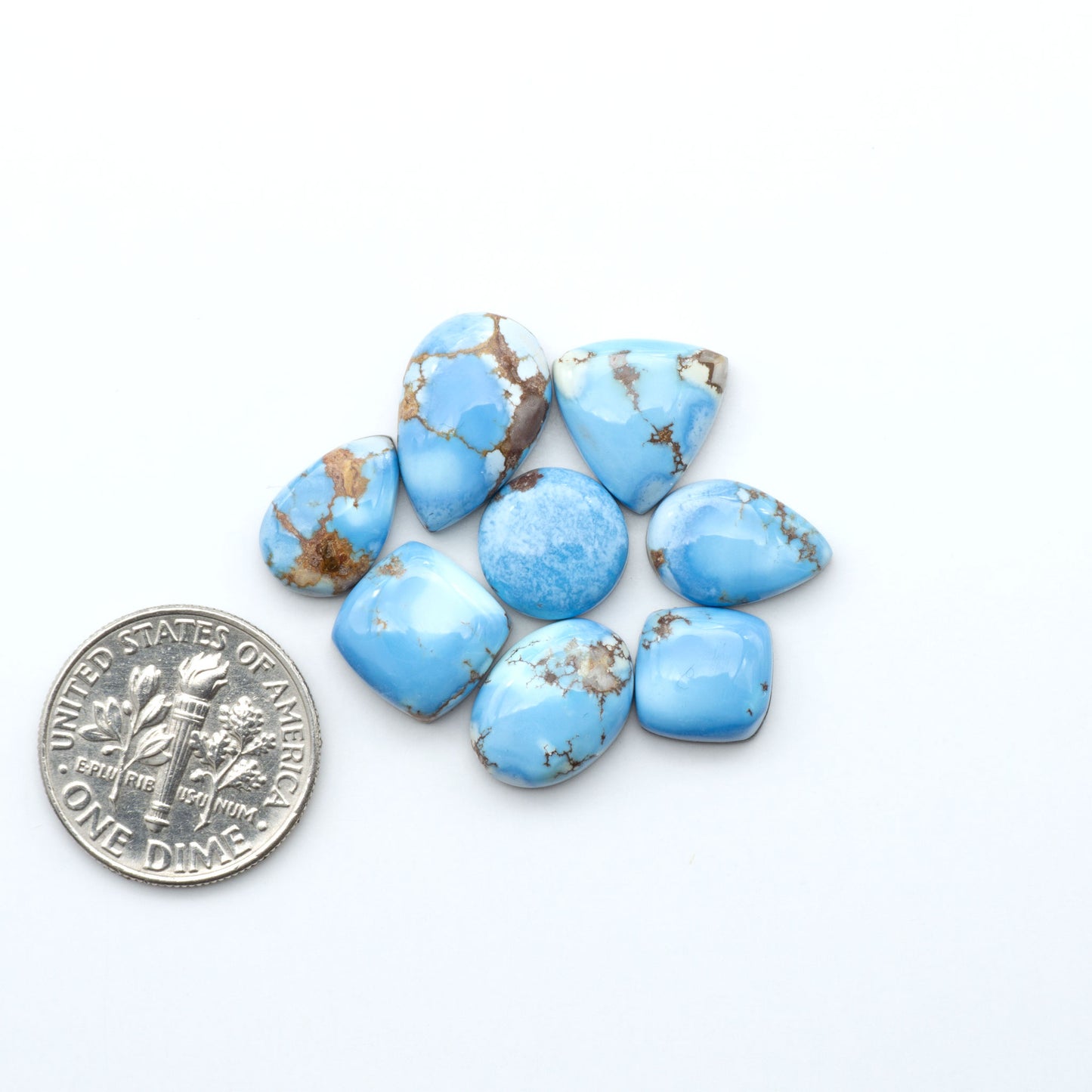 Discover the beauty of Natural Golden Hills Turquoise—prized for its icy blue tones, golden matrix, and exceptional quality. Ideal for artisan jewelry designs.
