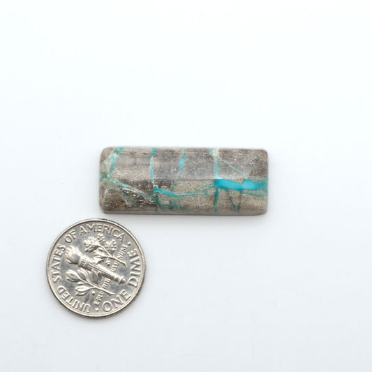 Polished Carico Lake turquoise cabochons showing vivid aqua-blue color and natural matrix
