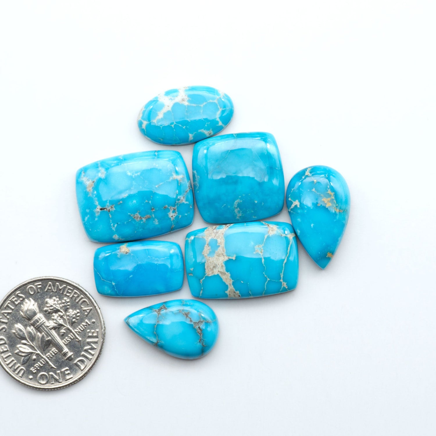 Sierra Bella Turquoise cabochons feature rich blue-green color and natural matrix variation. Ideal for silversmiths, jewelers, and custom jewelry designs