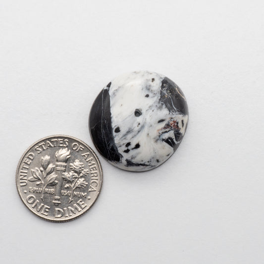 White Buffalo Stone Cabochons are semi-precious gemstones cut into shapes ideal for jewelry-making and crafting. The unique and varied veining of each cabochon lend an unparalleled depth and detail to any project, making them an excellent choice for artisans looking to add an individualistic touch.