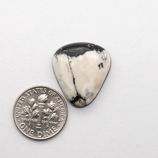 White Buffalo Stone Cabochons are semi-precious gemstones cut into shapes ideal for jewelry-making and crafting. The unique and varied veining of each cabochon lend an unparalleled depth and detail to any project, making them an excellent choice for artisans looking to add an individualistic touch.