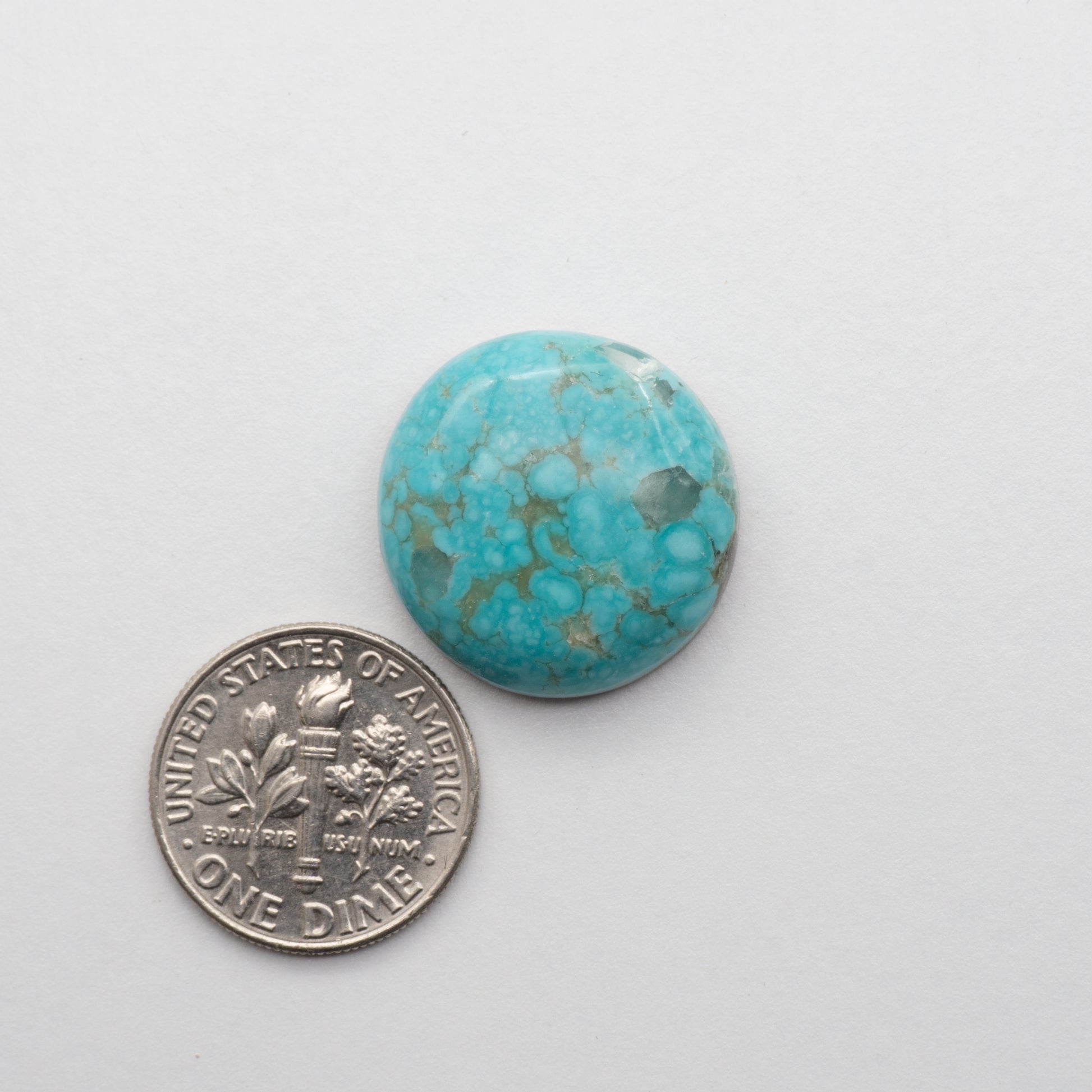 The Cumpas Turquoise is a captivating gemstone with a unique, blue-green color. Derived from a mixture of quartz and algae, this stone is perfect for use in jewelry or other decorative pieces. The natural beauty of the Cumpas Turquoise makes it a stunning addition to any collection.