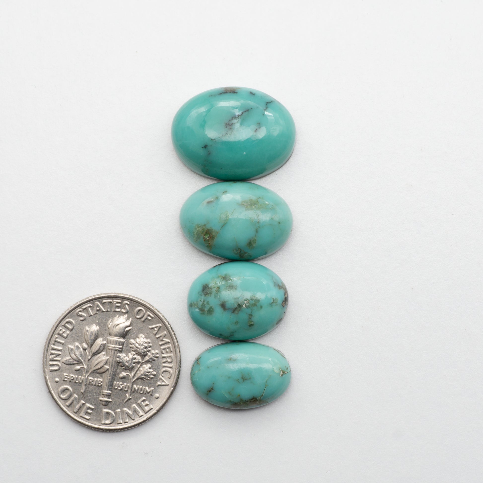 This beautiful Blue Green Campitos Turquoise Cabochon lot has a glossy finish and is backed for added strength. Mined in Sonora, MX. Similar to Kingman turquoise used for jewelry making.