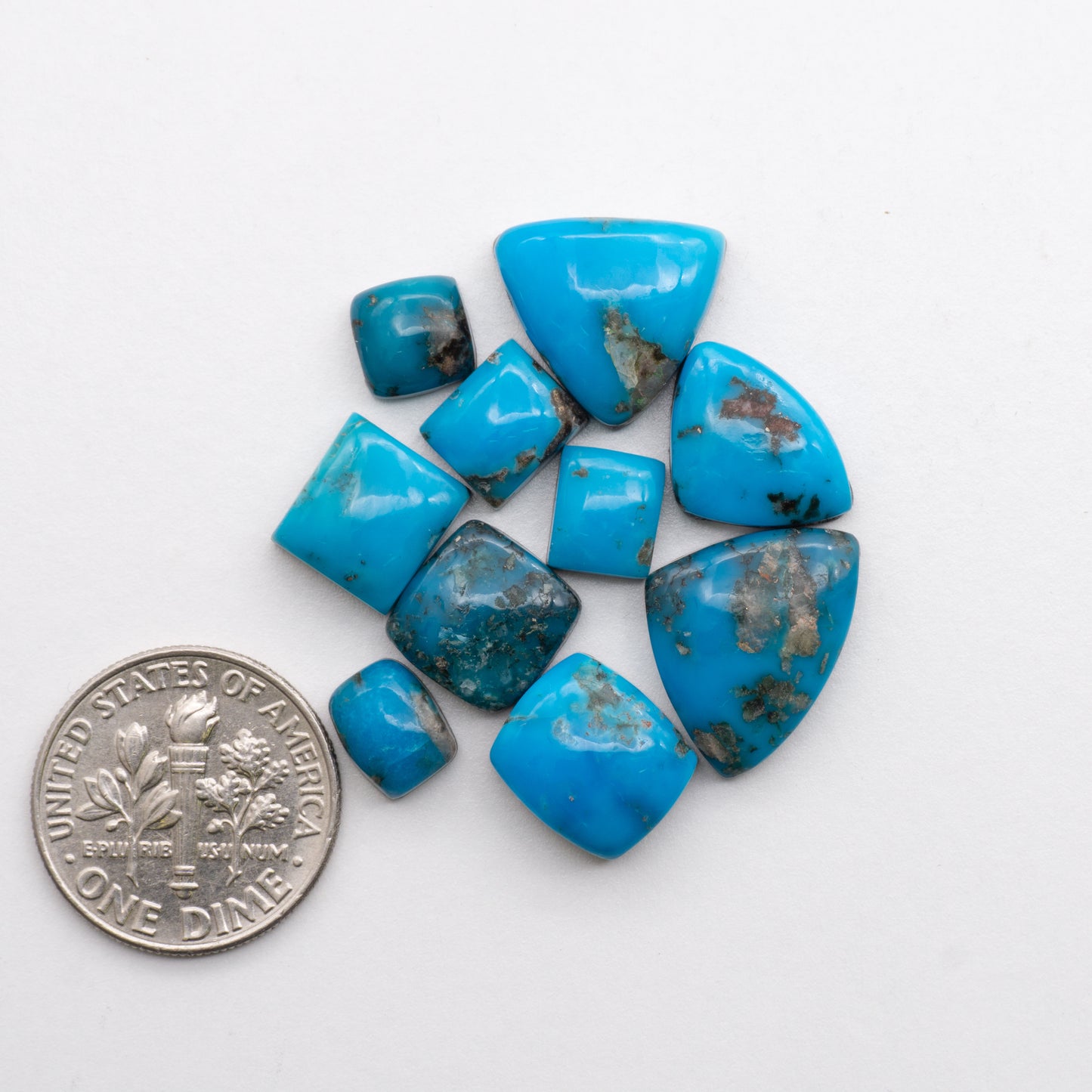 Add unique splashes of color to your jewelry with our Kingman Turquoise Cabochons. Featuring natural blue hues, these cabochons are backed for added strength and offer a beautiful contrast to any design. Perfect for necklaces, earrings, and more!