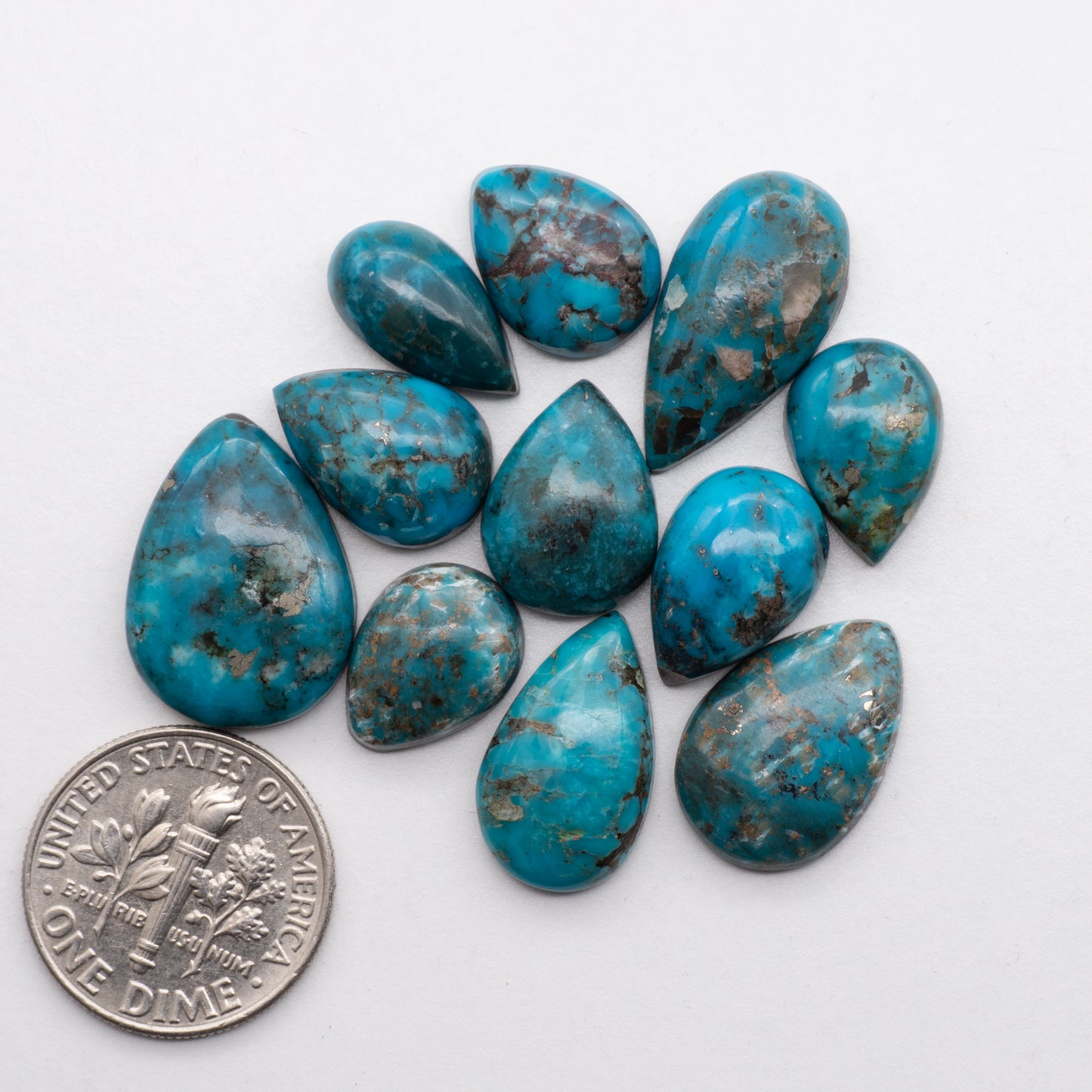 Add unique splashes of color to your jewelry with our Kingman Turquoise. Featuring natural blue hues, these cabochons offer a beautiful contrast to any design. These cabochons are backed for added strength, perfect for necklaces, earrings, and more!