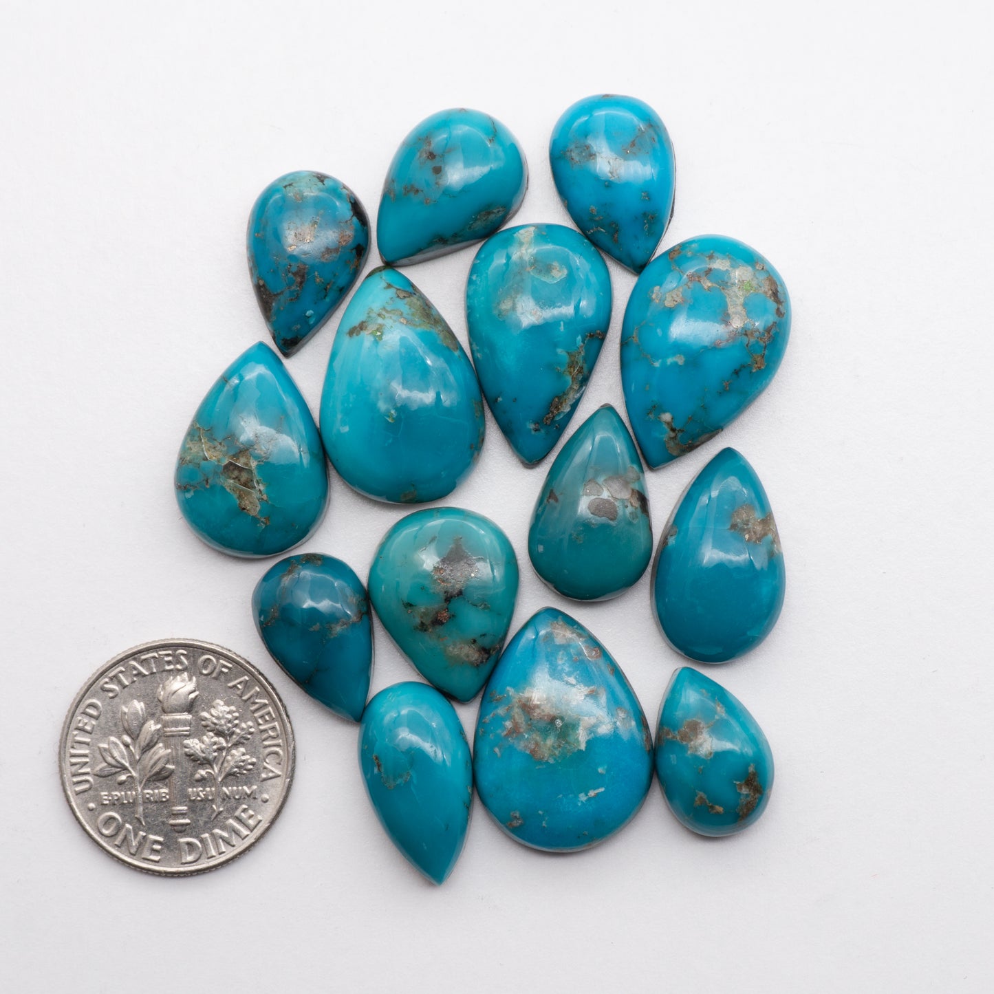 Add unique splashes of color to your jewelry with our Kingman Turquoise. Featuring natural blue hues, these cabochons offer a beautiful contrast to any design. These cabochons are backed for added strength, perfect for necklaces, earrings, and more!