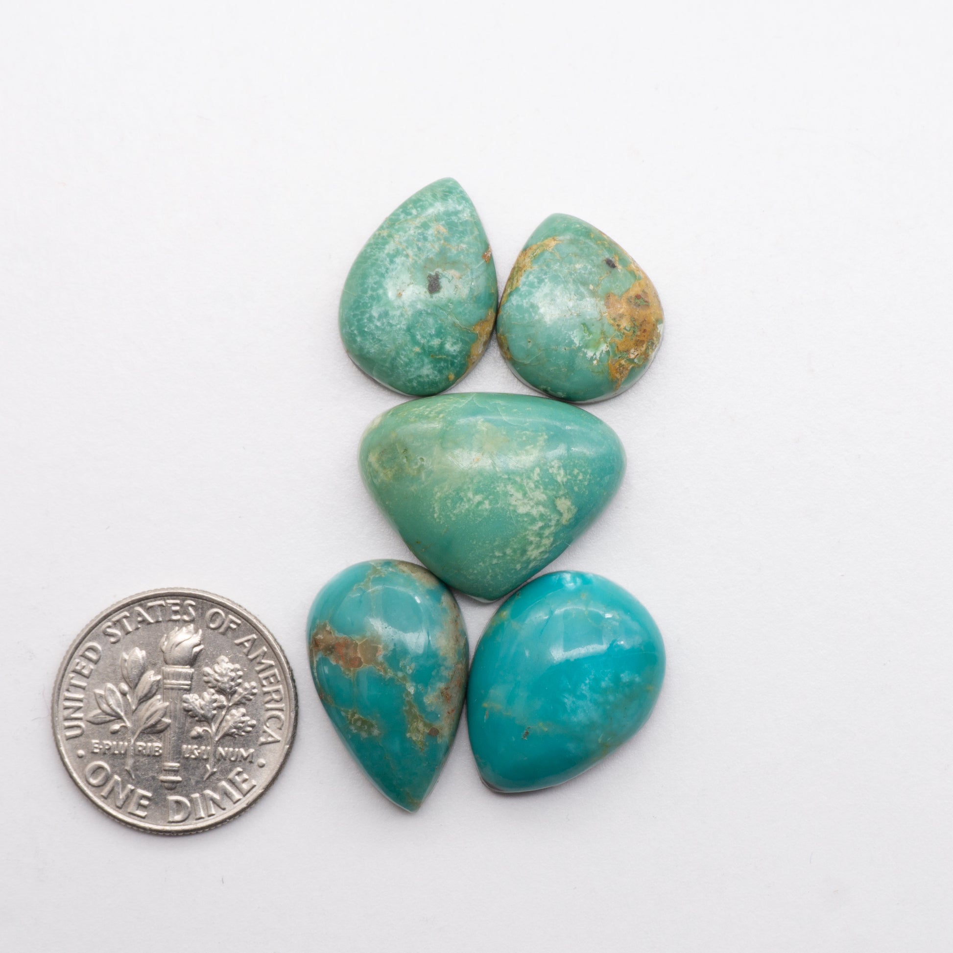 Add unique splashes of color to your jewelry with our Kingman Turquoise. Featuring natural blue hues, these cabochons offer a beautiful contrast to any design. These cabochons are backed for added strength, perfect for necklaces, earrings, and more!