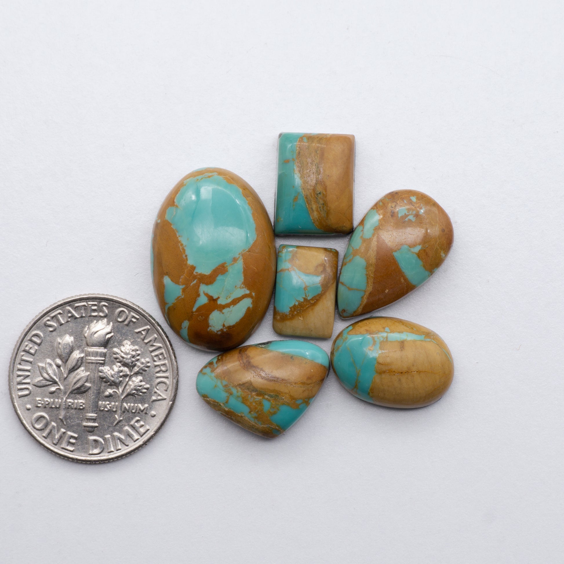 These beautiful blue green turquoise cabochons have a glossy finish and are backed for added strength. Mined in Colorado, USA. Similar to Royston turquoise used for jewelry making.