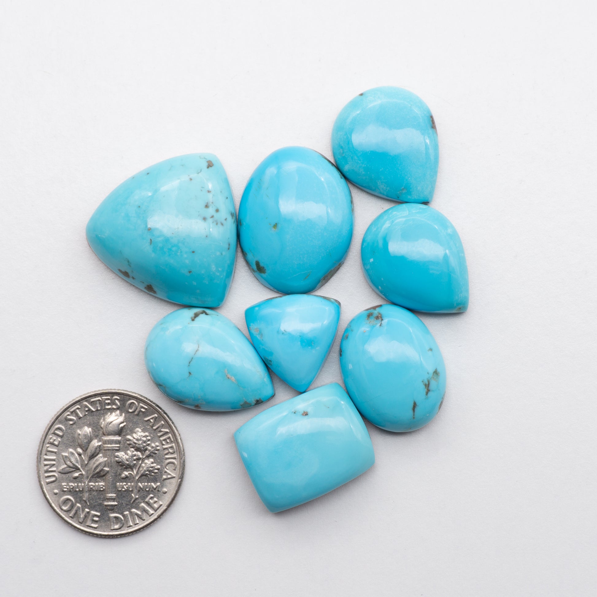 Add unique splashes of color to your jewelry with our Kingman Turquoise Cabochons. Featuring natural blue hues, these cabochons are backed for added strength and offer a beautiful contrast to any design. Perfect for necklaces, earrings, and more!