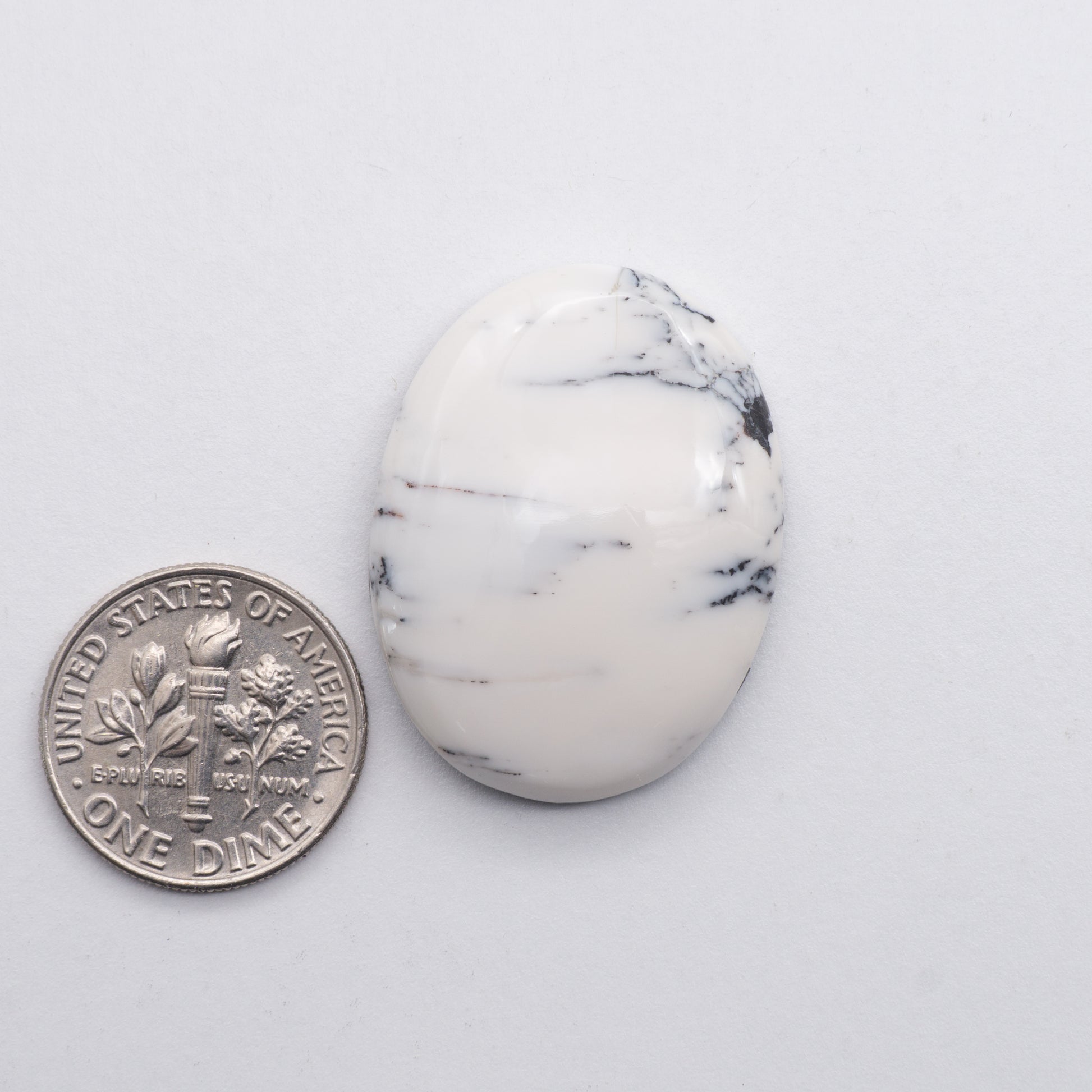 White Buffalo Cabochons have a glossy finish and are backed for added strength. White Buffaloe is mined in Nevada, USA White Buffalo is similar to turquoise and is used for jewelry making.