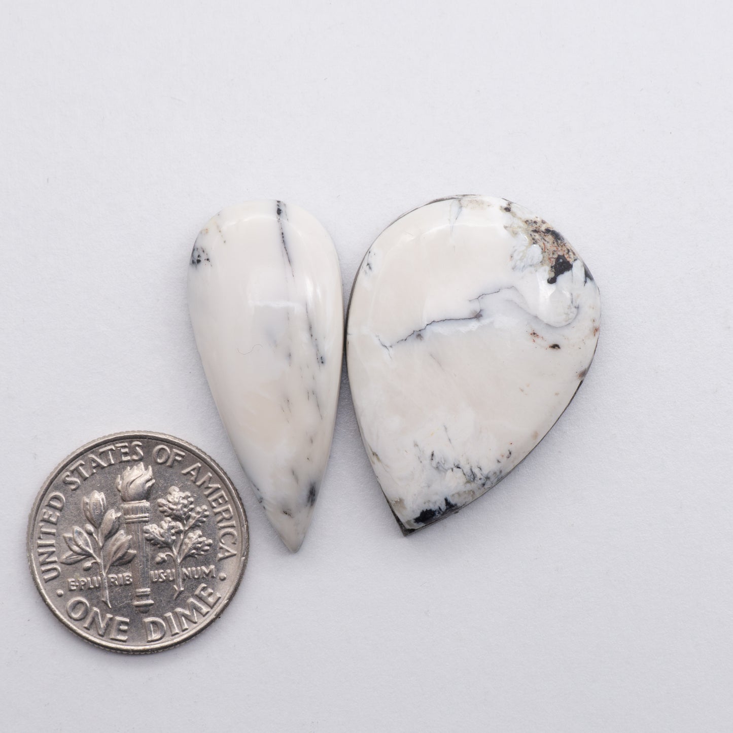 White Buffalo Cabochons have a glossy finish and are backed for added strength. White Buffaloe is mined in Nevada, USA White Buffalo is similar to turquoise and is used for jewelry making.