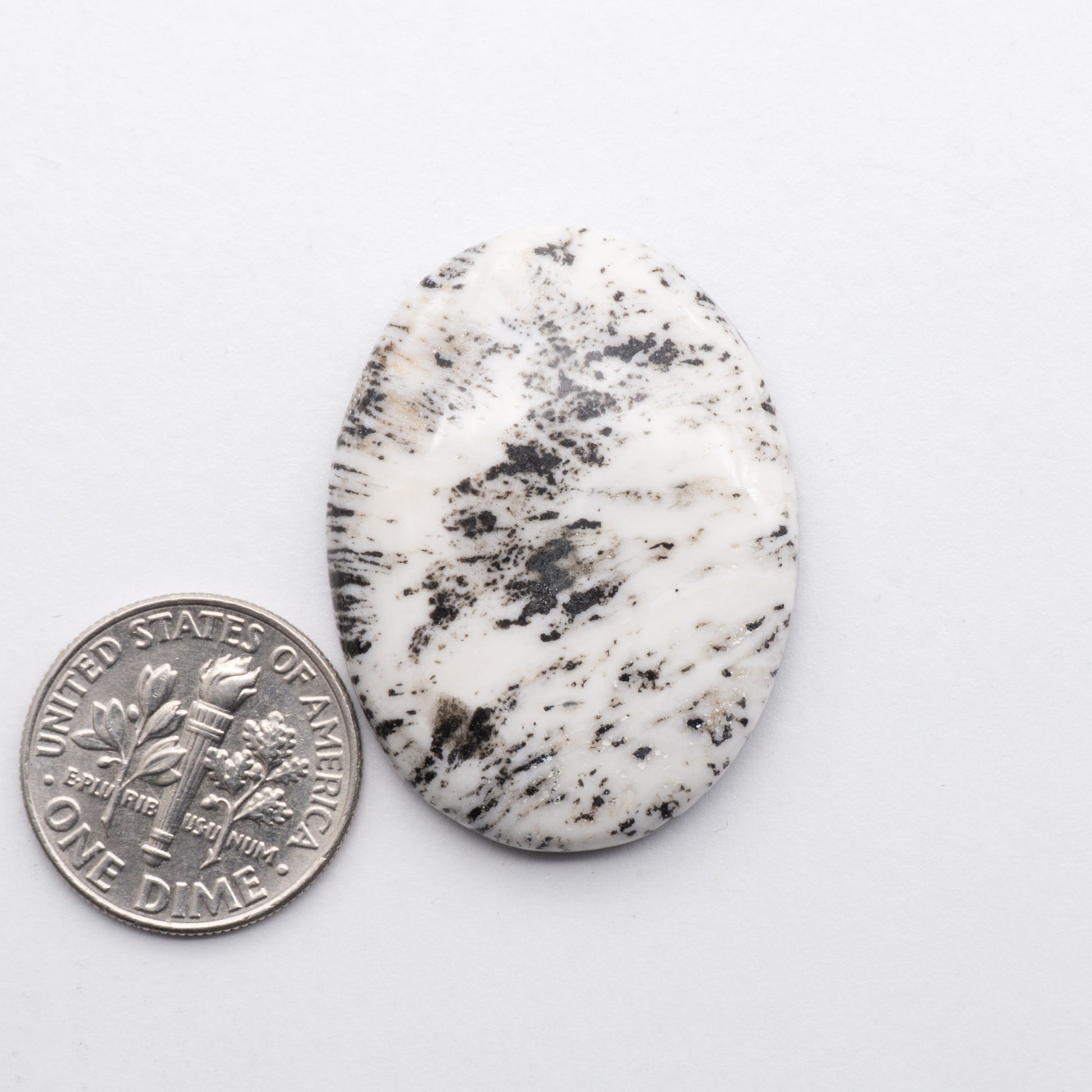 White Buffalo Cabochons have a glossy finish and are backed for added strength. White Buffaloe is mined in Nevada, USA White Buffalo is similar to turquoise and is used for jewelry making.