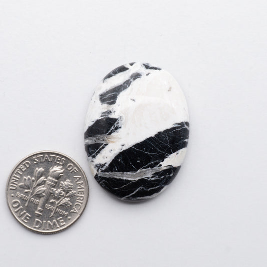 White Buffalo Cabochons have a glossy finish and are backed for added strength. White Buffaloe is mined in Nevada, USA White Buffalo is similar to turquoise and is used for jewelry making.