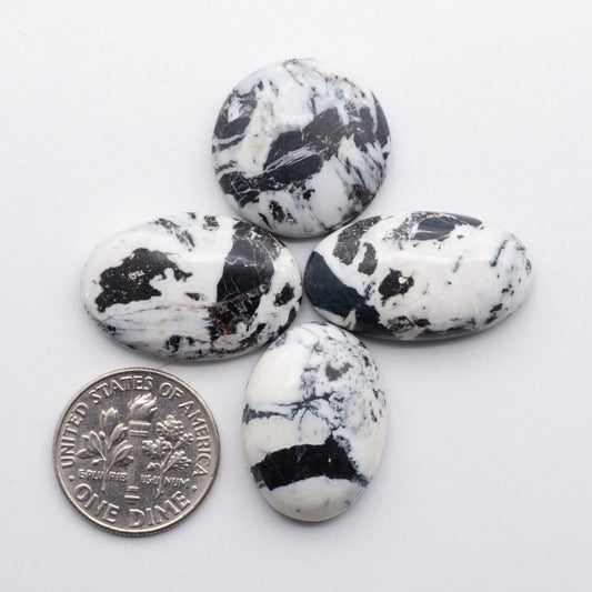 White Buffalo Cabochons have a glossy finish and are backed for added strength. White Buffaloe is mined in Nevada, USA White Buffalo is similar to turquoise and is used for jewelry making.