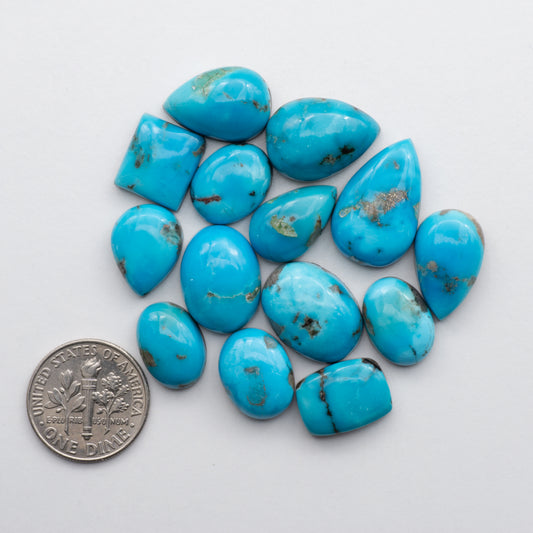 Kingman Turquoise Cabochons are a staple in the jewelry industry, known for their stunning blue-green color and durability
