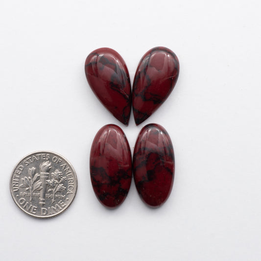 Bloody Bison Jasper is a composite stone  with a vibrant red hue and black matrix that creates a strong impression