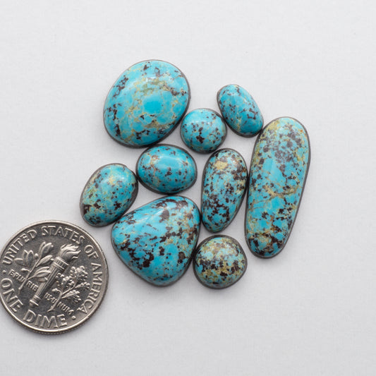 Natural Hubei Red Skin Turquoise Cabochons from Hubei, China. Glossy finish and backed for added strength.