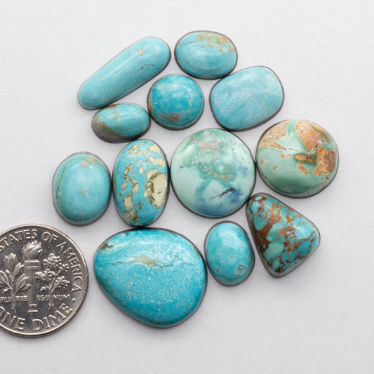 <span style="font-size: 0.875rem;">This mixed turquoise cabochon lot has a glossy finish and the stones are stabilized and backed for added strength.</span><br>