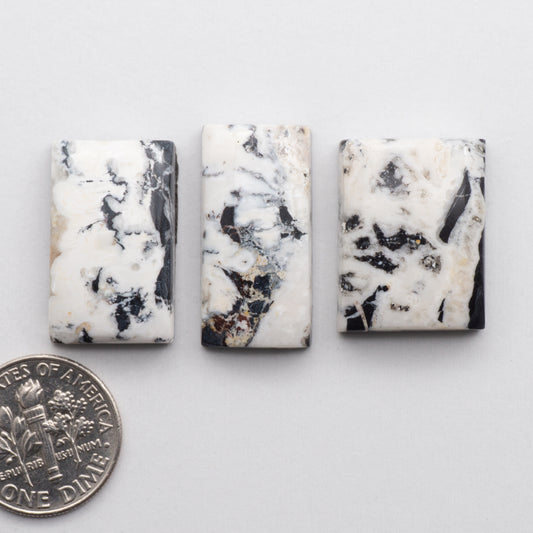 These Natural White Buffalo Stone Cabochons are semi-precious gemstones cut into shapes ideal for jewelry-making and crafting and are backed for added strength