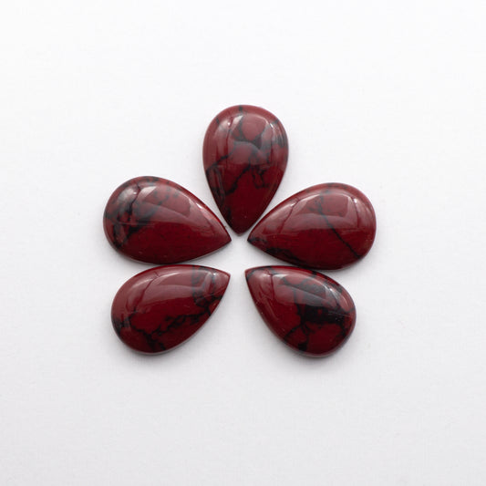 Bloody Bison Jasper is a composite stone&nbsp; with a vibrant red hue and black matrix that creates a strong impression.