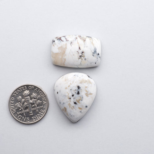 These Natural White Buffalo Stone Cabochons are semi-precious gemstones cut into shapes ideal for jewelry-making 