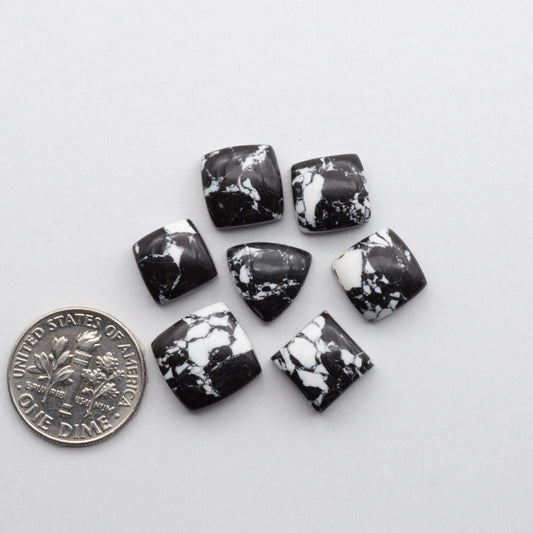 White Buffalo Cabochons are expertly cut and polished from composite material to create a stunning and durable gemstone. 