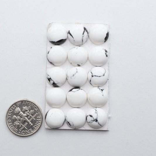 White Buffalo Cabochons are expertly cut and polished from composite material to create a stunning and durable gemstone.