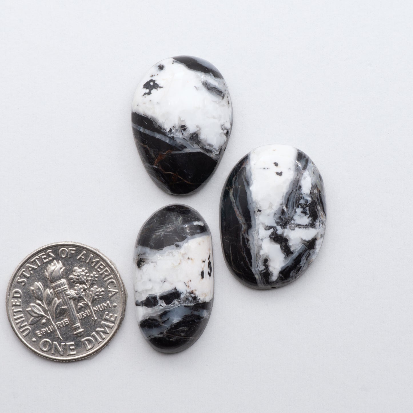 These Natural White Buffalo Stone Cabochons are semi-precious gemstones cut into shapes ideal for jewelry-making and are backed for added strength.