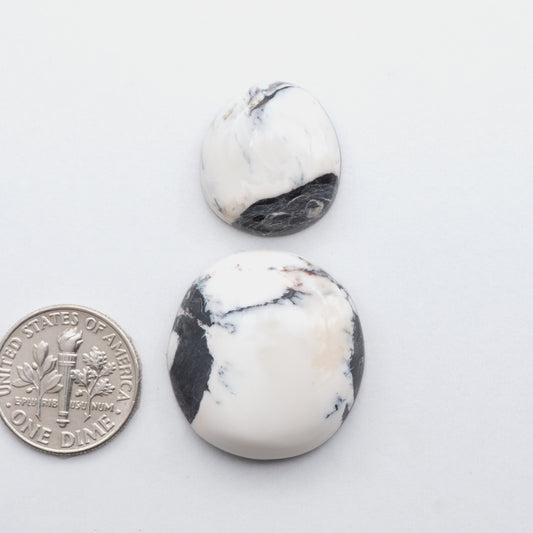 This Natural White Buffalo Stone Cabochon ia a semi-precious gemstone cut into a shape ideal for jewelry-making 