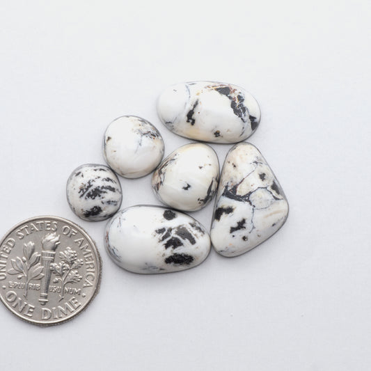 This Natural White Buffalo Stone Cabochon ia a semi-precious gemstone cut into a shape ideal for jewelry-making 