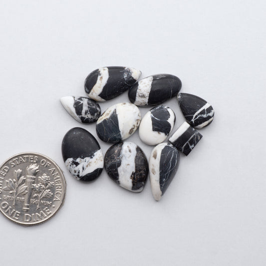 Natural White Buffalo Stone Cabochons are hand-cut semi-precious gemstones perfect for making unique and high-quality jewelry.&nbsp;