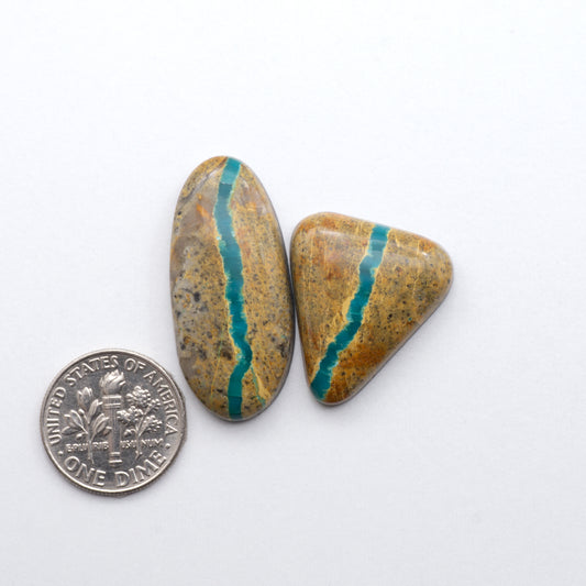 Royston Ribbon Turquoise cabochons are renowned for their unique shades of green, blues, making these cabochons a popular choice for jewelry makers