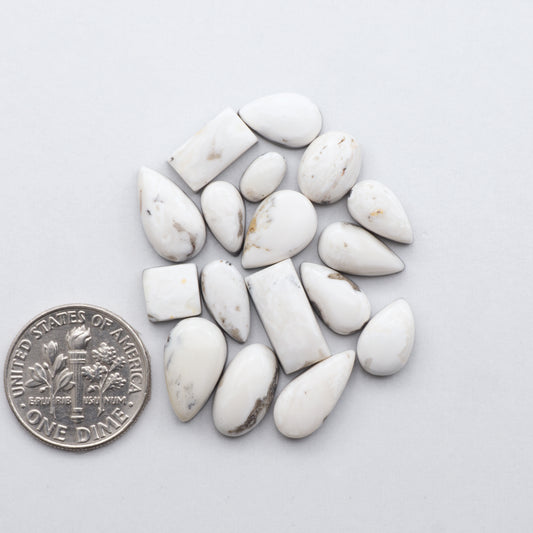 Natural White Buffalo Stone Cabochons are hand-cut semi-precious gemstones perfect for making unique and high-quality jewelry.&nbsp;